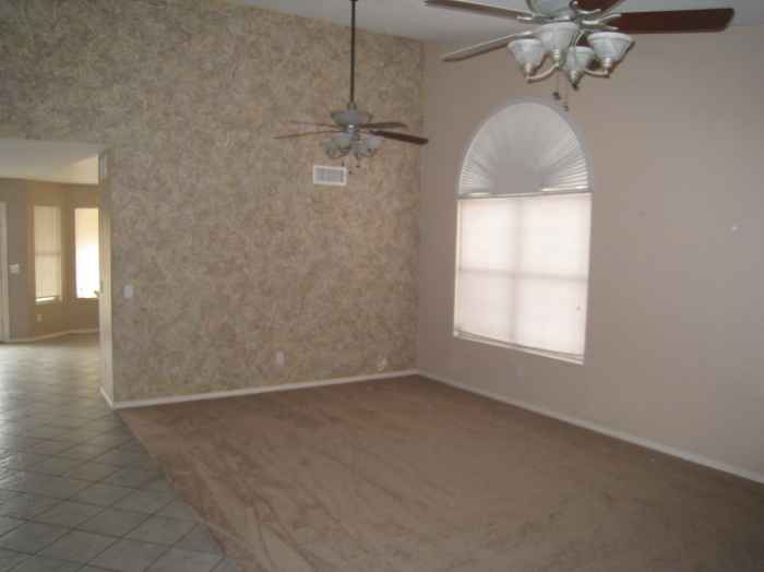 Living Room with Carpet and Tile in corridor